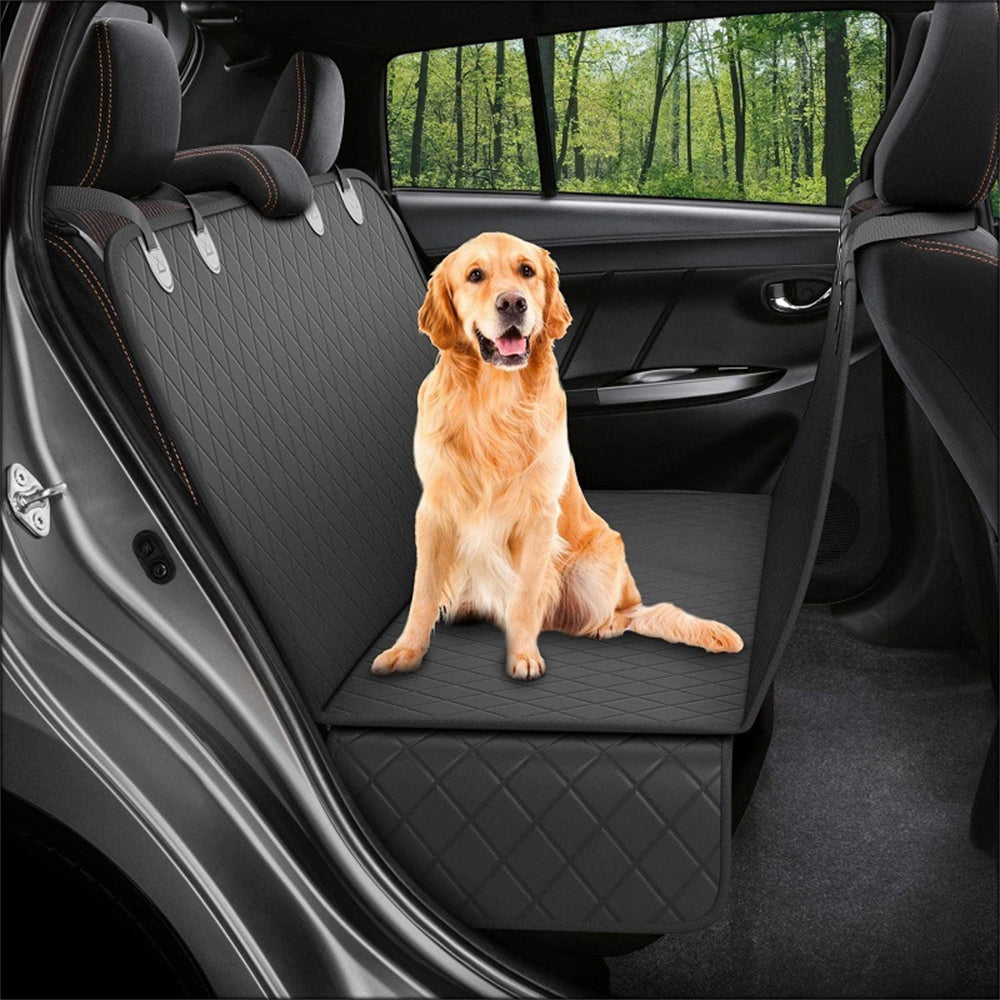 The Back Seat Hammock fitted in a car with a dog