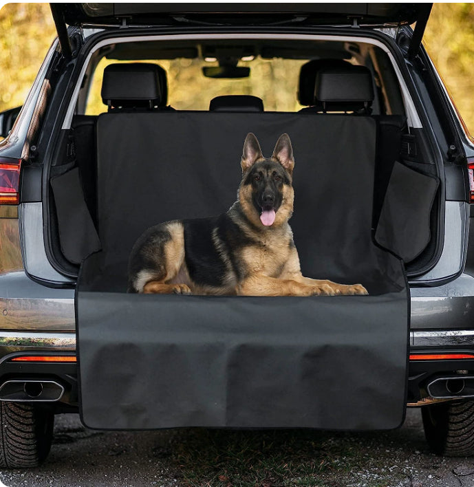 The Boot Liner fitted in a car boot with a dog